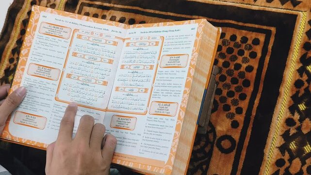 Finish reading the Quran with translation then close it