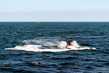 Man skiing on water scooter in Constanta, Romania