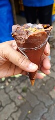 hand holding ice-cream 