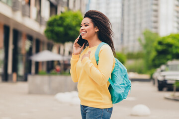 Photo of pretty lovely girl wear yellow stylish swetshirt go college autumn season weather outdoors