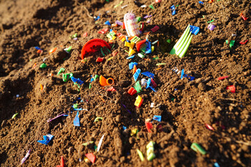 Microplastic pollution. Microplastics in ground. Soil contaminated with microplastics. Plastic...