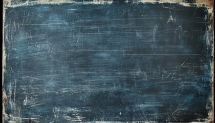 Obraz premium A worn, blue, wooden chalkboard with faint white chalk marks.