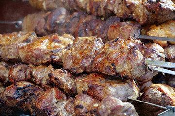 Meat on skewers. Grilled shashliks in a shashlik shop