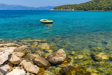 Abandoned lifeboat in the water