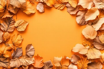 Autumn background with copy space in golden colors and dry leaves on an orange wall, top view. Autumn concept, banner design. Flat lay style. Text copy on the right side of the image.