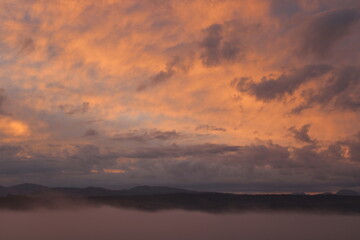Fototapeta premium fire in the sky orange sunset clouds