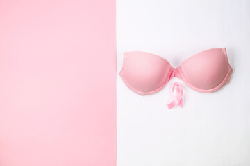 pink brassiere with pink ribbon over. Breast cancer concept