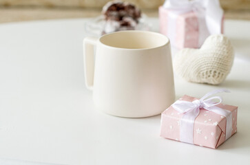 A cozy morning scene with coffee, a gift, and a crocheted heart. Perfect for Valentine's Day, birthdays, and other special occasions.