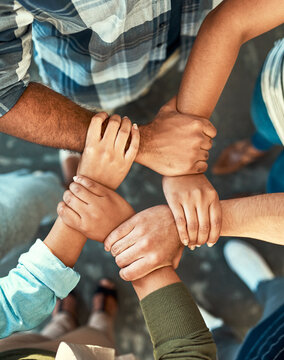 Strong, group and business people with hands for connection, collaboration or trust for solidarity in startup. Team, community or holding wrist in circle closeup for synergy, cooperation or integrity