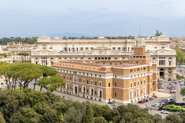 Rome, Italy - April 11, 2024: Rome, Italy - April 11, 2024: Rooftops and houses of the city of Rome, seen from the viewpoint of the Castel Santo Angelo in Rome, Italy