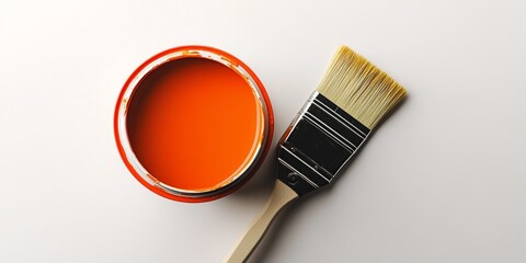 Orange Paint Can and Brush for Home Renovation Projects