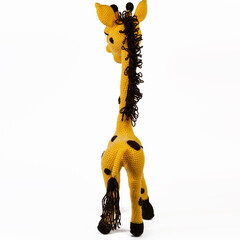 yellow spotted giraffe amigurumi with big eyes background isolated
