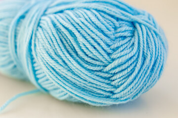 Blue yarn for knitting. Threads closeup. Yarn for creativity