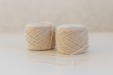White yarn for needlework. Natural