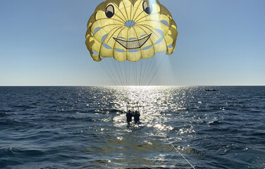 An exciting paragliding adventure in the brilliant summer sea