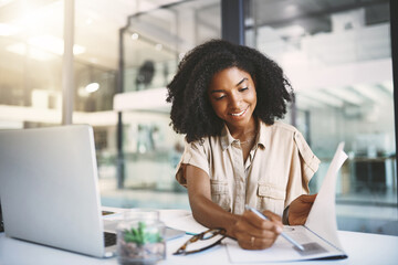 African woman, documents and reading in office with smile, check and administration at media company. Person, journalist or writer with report, proposal or stats for article review at creative agency