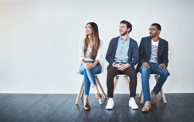Row, chair and group in waiting room, happy and professional in business, recruitment and smile....