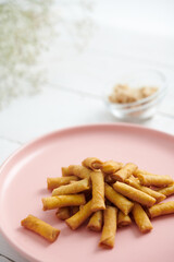 Sumpia cake, a traditional Malaysian and Indonesian dry snack, made from spring roll skin filled with dried shrimp. Also known as Popia Udang Kering.