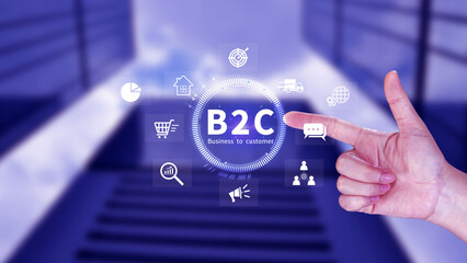 B2C, Business to customer marketing strategy concept. Businessman holding with virtual B2C icon for business strategy, communication, feedback, online marketing, Ecommerce marketing strategy.
