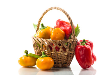 ripe red and yellow sweet peppers.