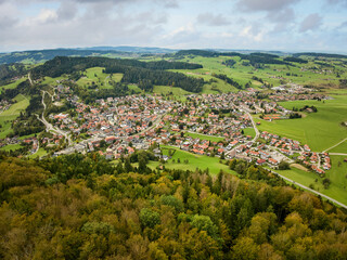 Obraz premium Aerial photo of the village of Oberstaufen in the Allgaeu Alps, Bavaria, Germany