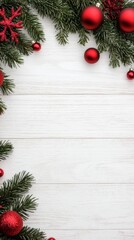 Festive decorations with red ornaments on a white wooden background.