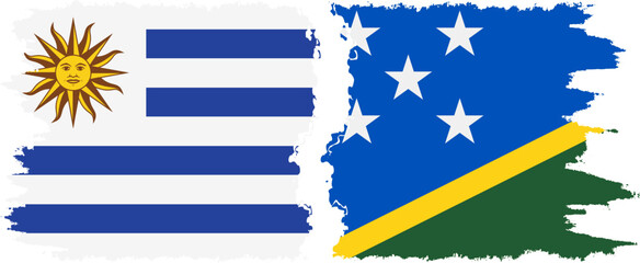 Solomon Islands and Uruguay grunge flags connection, vector