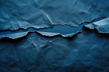 Torn dark blue paper edge