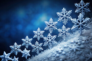 Snowflakes on frosty blue background in wintertime