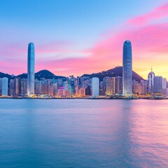 Obraz premium A vibrant sunset view of a city skyline reflecting on water.