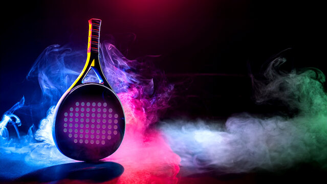 Padel tennis racket in neon lights. Background with copy space. Mockup for padel event tournament design. Open tour.