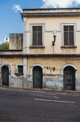 Old weathered timeworn shabby house front in Funchal, Madeira