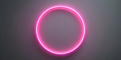 Neon pink circle on grey background with low angle