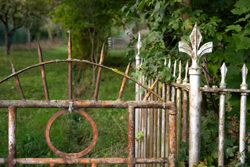 Rusty entrance gate at the old garden - taken in the fall in southern Germany.