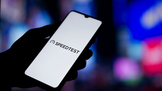 Dhaka, Bangladesh- 12 Oct 2024: Speedtest logo is displayed on smartphone.