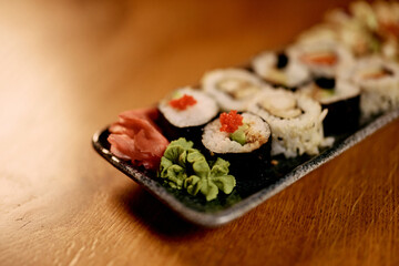 Assorted Sushi Rolls on a Stylish Slate Serving Platter