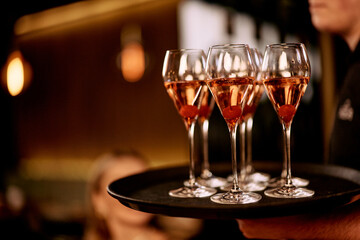 Elegant Party Setting with Sparkling Rosé Champagne Glasses