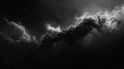 Dramatic black and white clouds create moody atmosphere in sky
