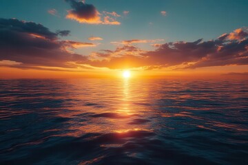 Obraz premium Sunrise over a calm ocean, symbolizing new beginnings and fresh starts