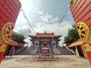 Wat Boromracha Kanchanapisek Anusorn or Wat Leng Noei Yi 2, A Chinese spiritual complex with brightly painted pagodas  shrines with golden seated Buddhas.