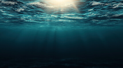 Obraz premium Underwater view of ocean with sunlight filtering through surface waves, casting beams of light into the deep, creating a serene and tranquil aquatic scene.