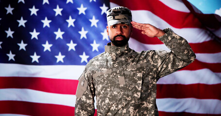 Fototapeta premium Military US Soldier Saluting Flag