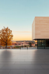 Obraz premium Modern architectural design with autumn trees and city skyline at sunset in serene landscape