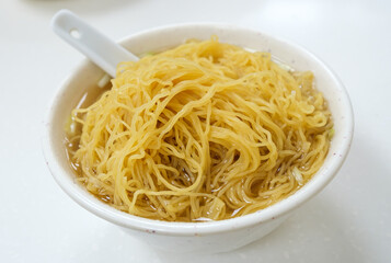 Authentic Hong Kong style wonton noodle soup with the wonton (dumpling) invisible and of small portion 