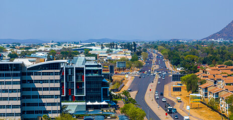 Obraz premium aerial view, Gaborone Botswana, residential and business district, split by main street road, real estate developer ,