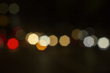 Blurred lights car lamps on a street
