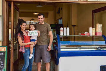 Family, portrait or open sign with ice cream for small business with child, smile or board. Parents, mom and dad with boy or kid for selling treats or dessert in shop for service or entrepreneurship