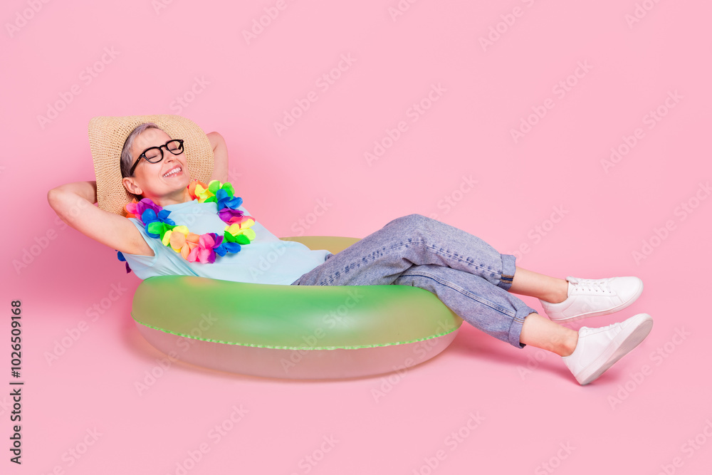 Canvas Prints Full size photo of pretty aged woman inflatable ring sleep isolated on pink color background