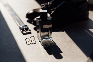 Grooms accessories for wedding, rings, shoes in smoke. Wedding day