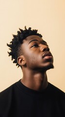 Fototapeta premium Thoughtful Person with Neutral Expression Looking Upward